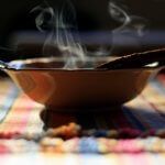 steaming bowl of soup close up