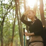 Young woman feeling exhausted during the trekking - how to prevent heat exhaustion