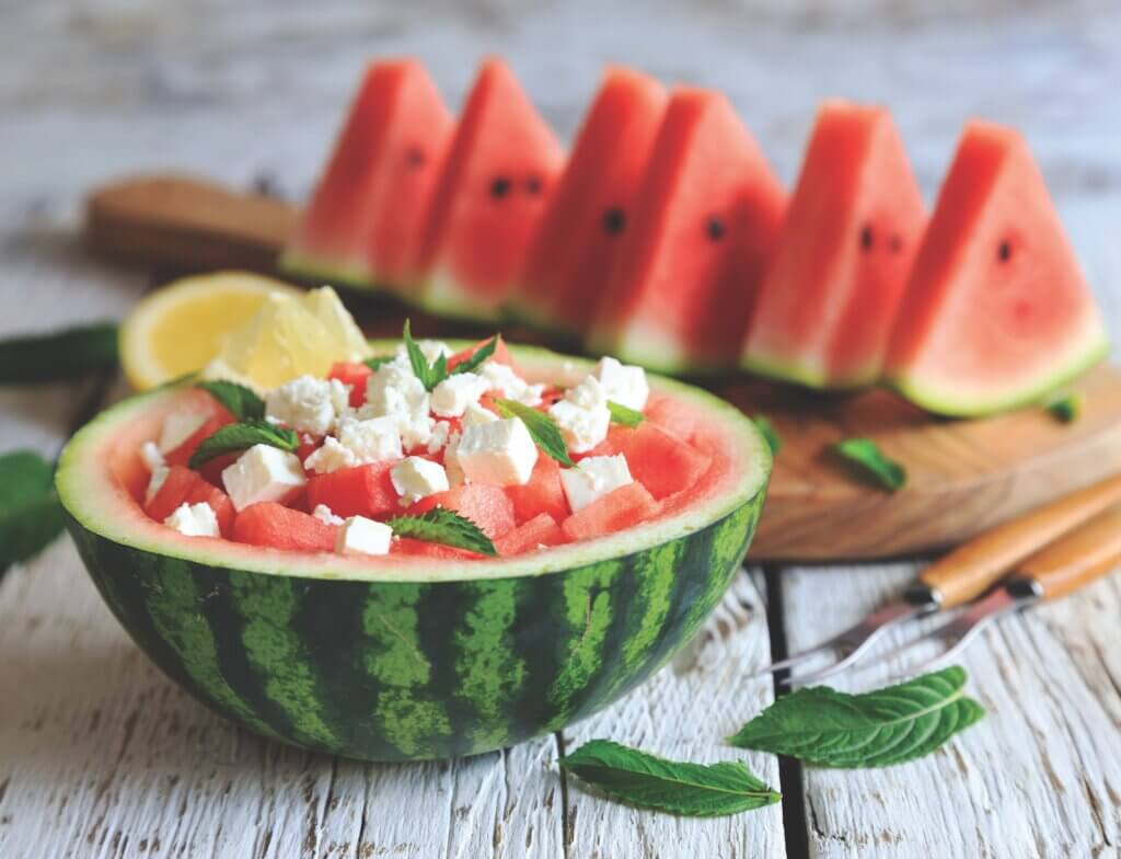 watermelon salad with feta served in watermelon